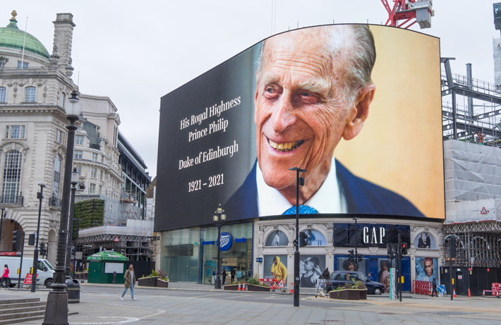 The giant screens of Piccadilly Circus paying respect to His Royal Highness Prince Philip the Duke of Edinburgh as the announcement of his death. London - 10th April 2021