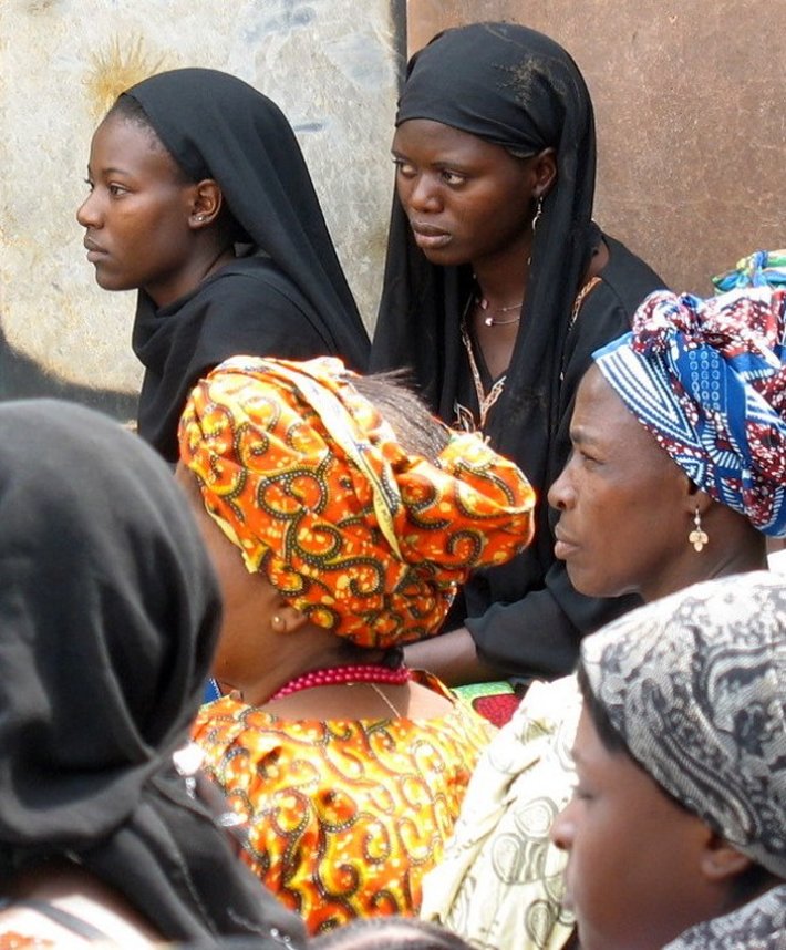 Women’s Fellowship at Christian church in Rikkos, Nigeria, 2009 in a burned out, roofless church where the pastor was killed and the church burned in 2008.